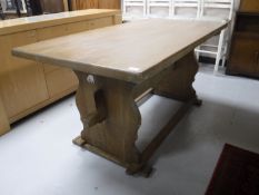An oak refectory dining table