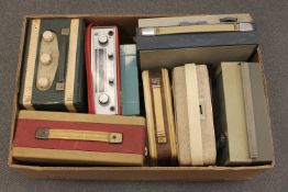 A box of eight transistor radios;