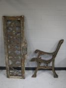 A pair of cast iron bench ends,