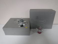 Two boxes containing three glass teapot and three glass coffee pot paperweights