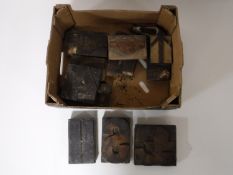 A box containing wooden printers blocks