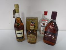 A 70cl bottle of Gibsons London Dry Gin, together with a 1L bottle of Glayva liqueur,