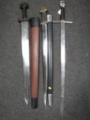 A longsword together with two swords in sheathes