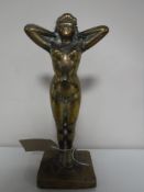 A heavy brass statuette figure of a lady