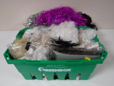 Two boxes containing assorted wigs