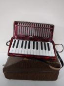 A Galoffa accordion in carry case