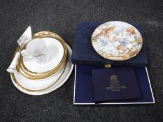 Four Royal Worcester milk jugs and three Royal Worcester miniature cups and saucers together with