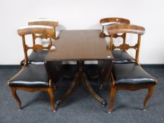 A Regency style drop leaf pedestal dining table,