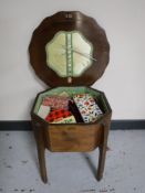 An oak mid twentieth century sewing box with contents