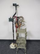 A brass three tier pan stand, bundle of carpet beater,