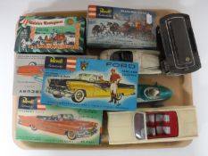 A tray containing mid twentieth century boxed and unboxed toys,