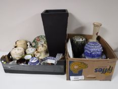 Two boxes containing blue and white dinnerware, Ringtons caddy, hand painted glass vase,