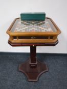 A Scrabble Collector's Edition board on pedestal stand,