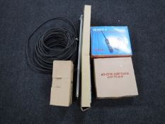 An unused Compac portable phone network system including antenna cables and chargers
