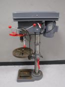 A Tooltec plus twelve step varial speed drill press