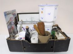 A box of framed sailing pictures, china planter on stand, boxed Fairy Dream figure,
