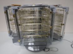 Three counter top revolving jewellery cabinets with keys