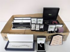 A box of costume and fashion jewellery - rings,