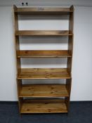 A set of pine open bookshelves