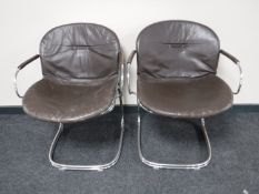 A pair of mid twentieth century chrome tubular metal leather upholstered armchairs
