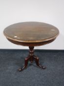 A Victorian mahogany tilt top pedestal occasional table