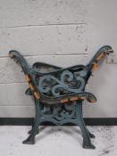 A pair of cast iron bench ends