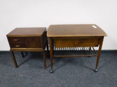 A mid twentieth century walnut cabinet fitted two drawers together with a sewing trolley