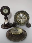 A marble quartz mantel clock,