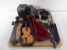 A tray containing Citron gents wristwatch, drawing instrument in case, costume brooches, pen knife,