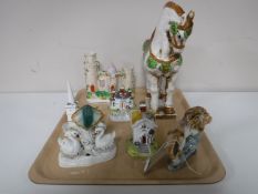 A tray containing Chinese pottery tan horse, pottery figure lion on rock,