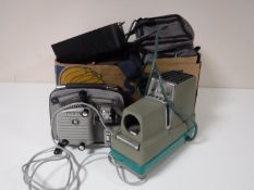 Two boxes of projectors, cameras, camera bags, strobe light,