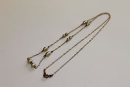 A 9ct gold necklace set with pearls