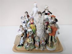 A tray containing a quantity of continental figurines