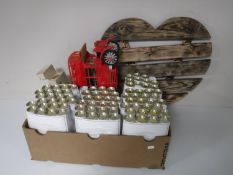 A box containing incense sticks, wooden folk art bus,