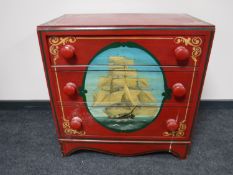 A painted oak three drawer chest depicting a three masted ship