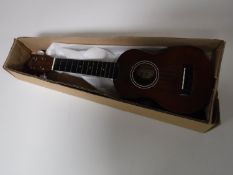 A boxed Lanikai ukulele