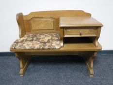 An oak telephone table