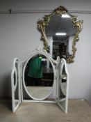 A cream and gilt triplex dressing table mirror,