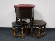 Three hexagonal leather upholstered stools