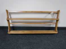An Ercol elm plate rack