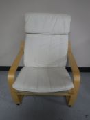 An Ikea beech framed relaxer chair
