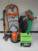 A Flymo electric lawn mower with lead, together with a a garden vac,