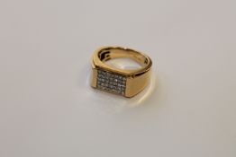 A heavy 18ct gold signet ring set with 28 princess cut diamonds, 8.4g, size P.