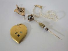 A yellow metal opal and pearl pendant, an opal pin,