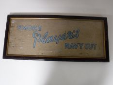 A mahogany framed Players Navy Cut advertisement