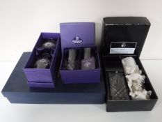 A box of six Rockington Crystal wine glasses (one damaged),
