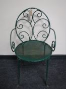 A metal child's garden armchair