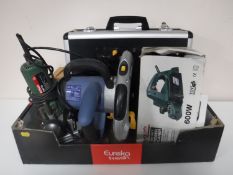 A box containing aluminium cased Bosch router and bits, Powercraft circular saw,