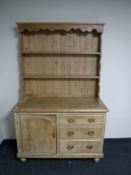 An antique pine kitchen dresser