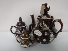Three graduated Barge Ware tea pots
